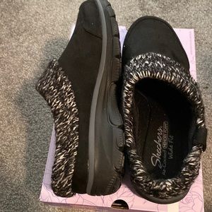 Skechers water repellent shoes; size 9W